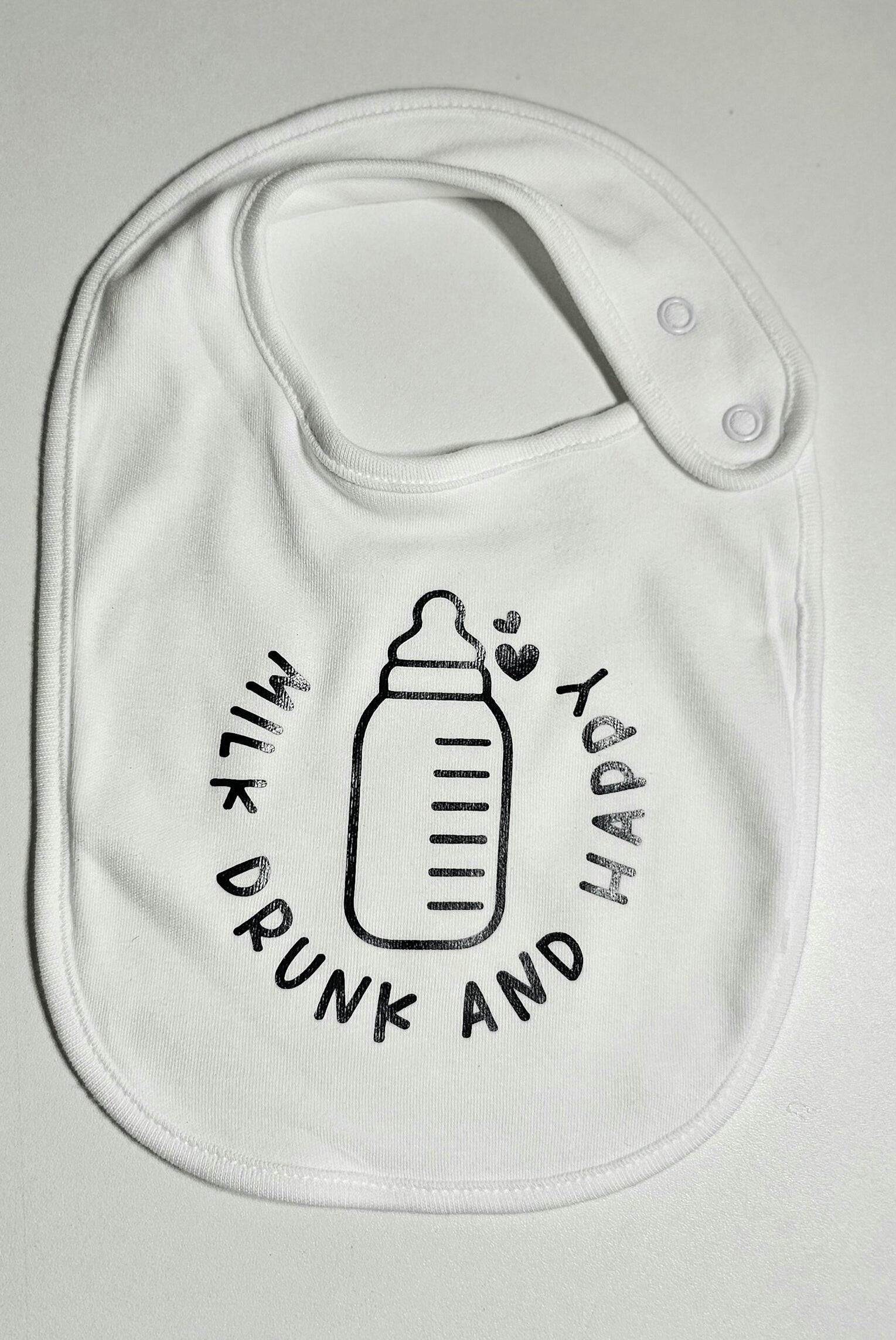 Milk drink and happy bib